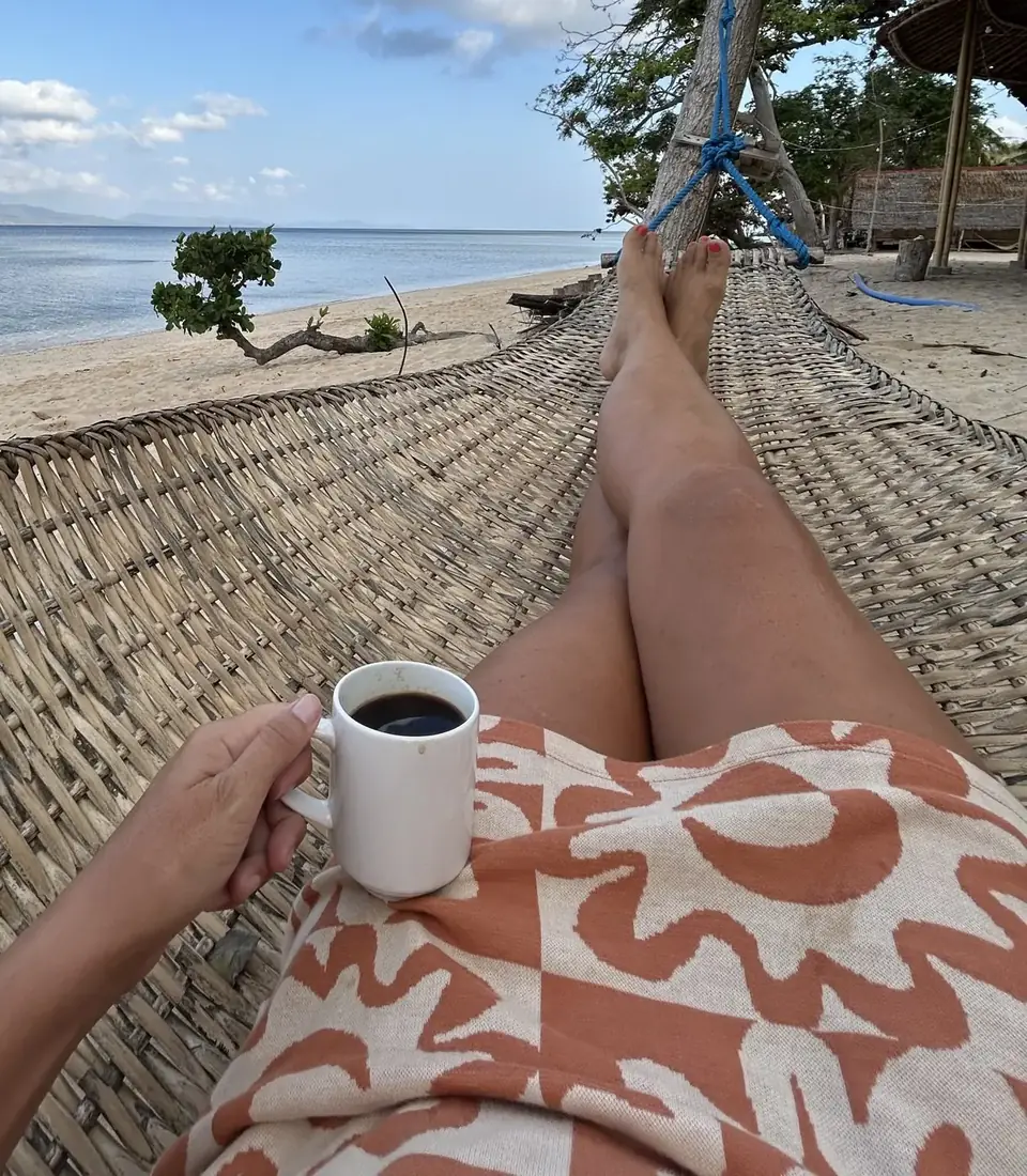 Coffee in a hammock on the beach